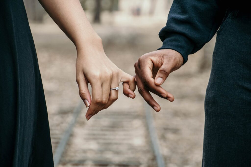 Couple holding hands. image for couples therapy.